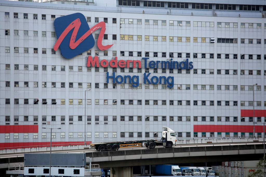 A truck drives past a Modern Terminals Limited building, part of Kwai Tsing Container Terminals. Photo: Reuters