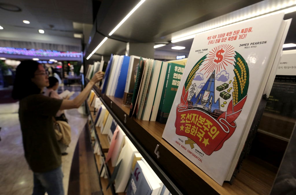 A copy of the Korean version of “Capitalist People’s Republic of Korea” is displayed at Kyobo Book Store in Seoul in August 2017. Photo: AP A copy of the Korean version of “Capitalist People’s Republic of Korea” is displayed at Kyobo Book Store in Seoul in August 2017. Photo: AP