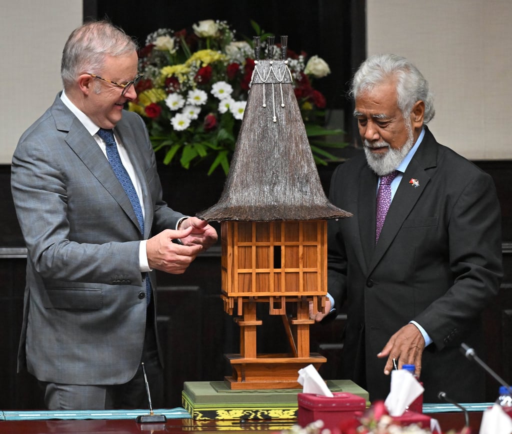 Australian Prime Minister Anthony Albanese (left) receives a gift from East Timor’s Prime Minister Xanana Gusmao during an official visit to Dili on January 28. Photo: EPA