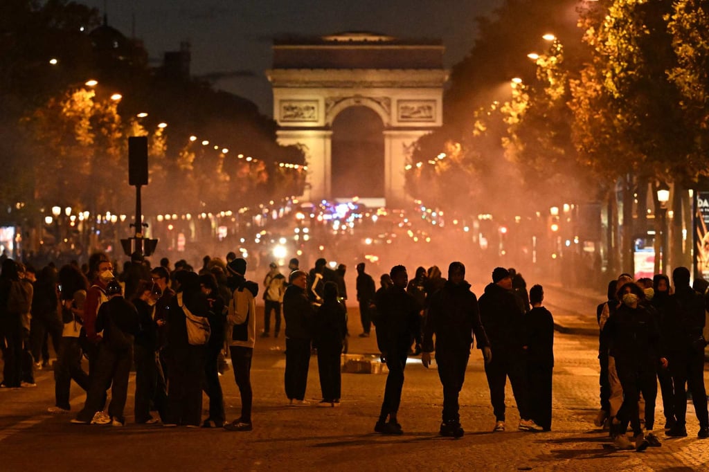 Protesters gather on the Champs-Elysees Avenue during a demonstration to protest against the “high cost of living”, in Paris last week. Photo: AFP Protesters gather on the Champs-Elysees Avenue during a demonstration to protest against the “high cost of living”, in Paris last week. Photo: AFP