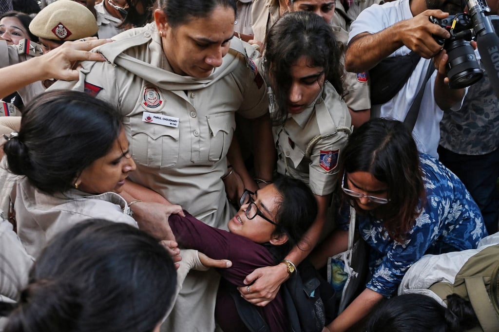 Prominent student leader Neha Bora (centre) is detained by the police during a youth demonstration demanding the resignation of the country’s election chief Gyanesh Kumar in New Delhi last week. Photo: AP Prominent student leader Neha Bora (centre) is detained by the police during a youth demonstration demanding the resignation of the country’s election chief Gyanesh Kumar in New Delhi last week. Photo: AP