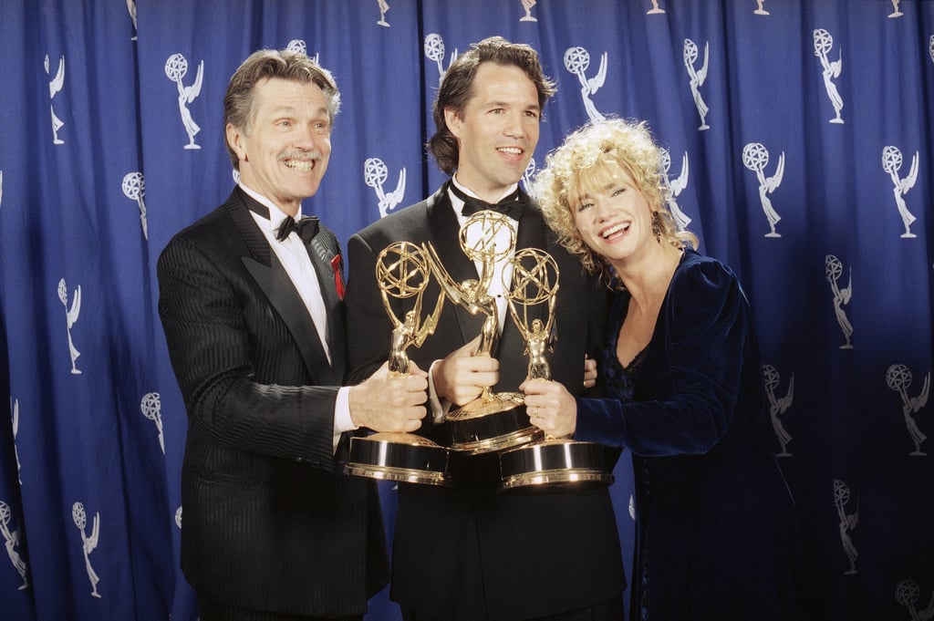 David E. Kelley (centre), creator of “Picket Fences,” poses with Tom Skerritt and Kathy Baker after show won best drama series during the 45th annual Emmy Awards in Pasadena, California, in September 1993. Photo: AP