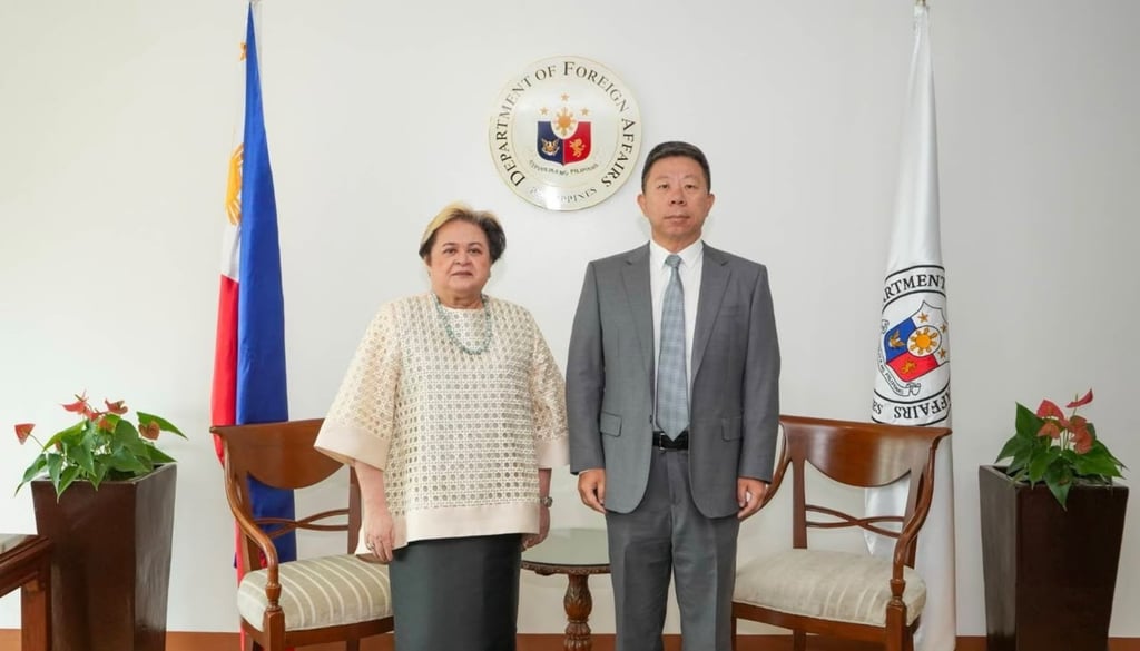 Philippine Foreign Secretary Ma. Theresa Lazaro (left) meets Chinese envoy Jing Quan in Manila on Monday. Photo: EPA/Department of Foreign Affairs