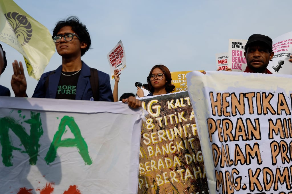 Students hold placards and banners during a protest in Jakarta, Indonesia, on Monday demanding the government step up actions against wildfires and haze. Photo: EPA