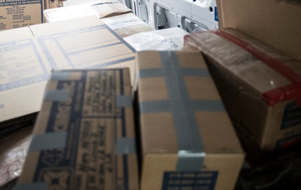 Balikbayan boxes loaded into a truck in Carson, California, to be shipped to families in the Philippines. Photo: TNS