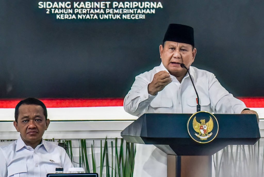 Indonesian President Prabowo Subianto (right) delivers his remarks while leading a plenary cabinet meeting at the presidential palace complex in Jakarta on Wednesday. Photo: AFP