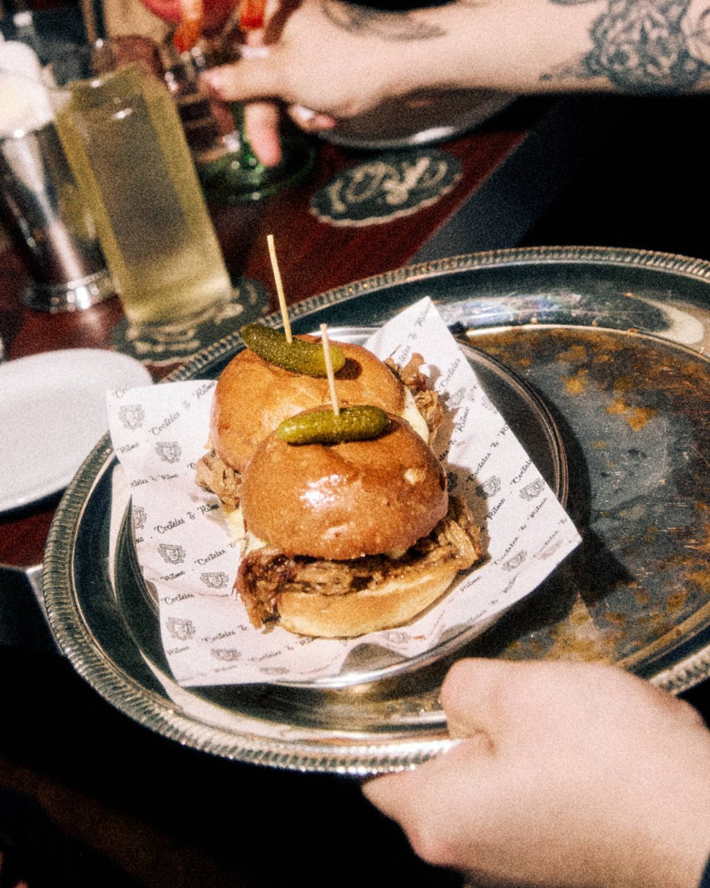 Montana’s pulled pork sliders are as much a hit as the drinks. Photo: Handout