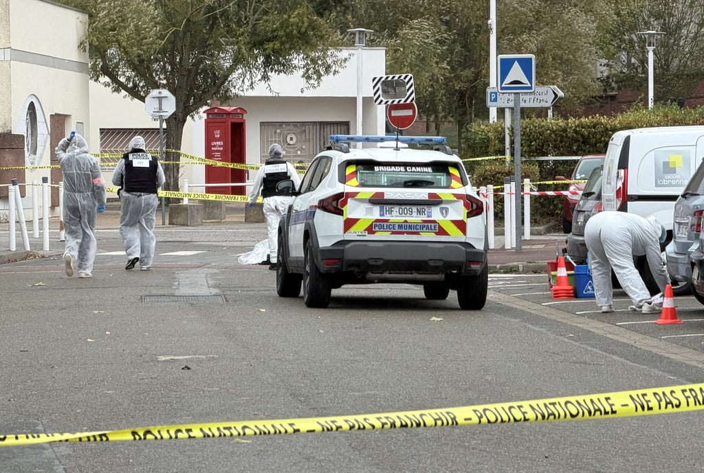 French police work at the scene after a drive-by shooting in Trappes, near Paris, on Friday. Photo: Reuters French police work at the scene after a drive-by shooting in Trappes, near Paris, on Friday. Photo: Reuters