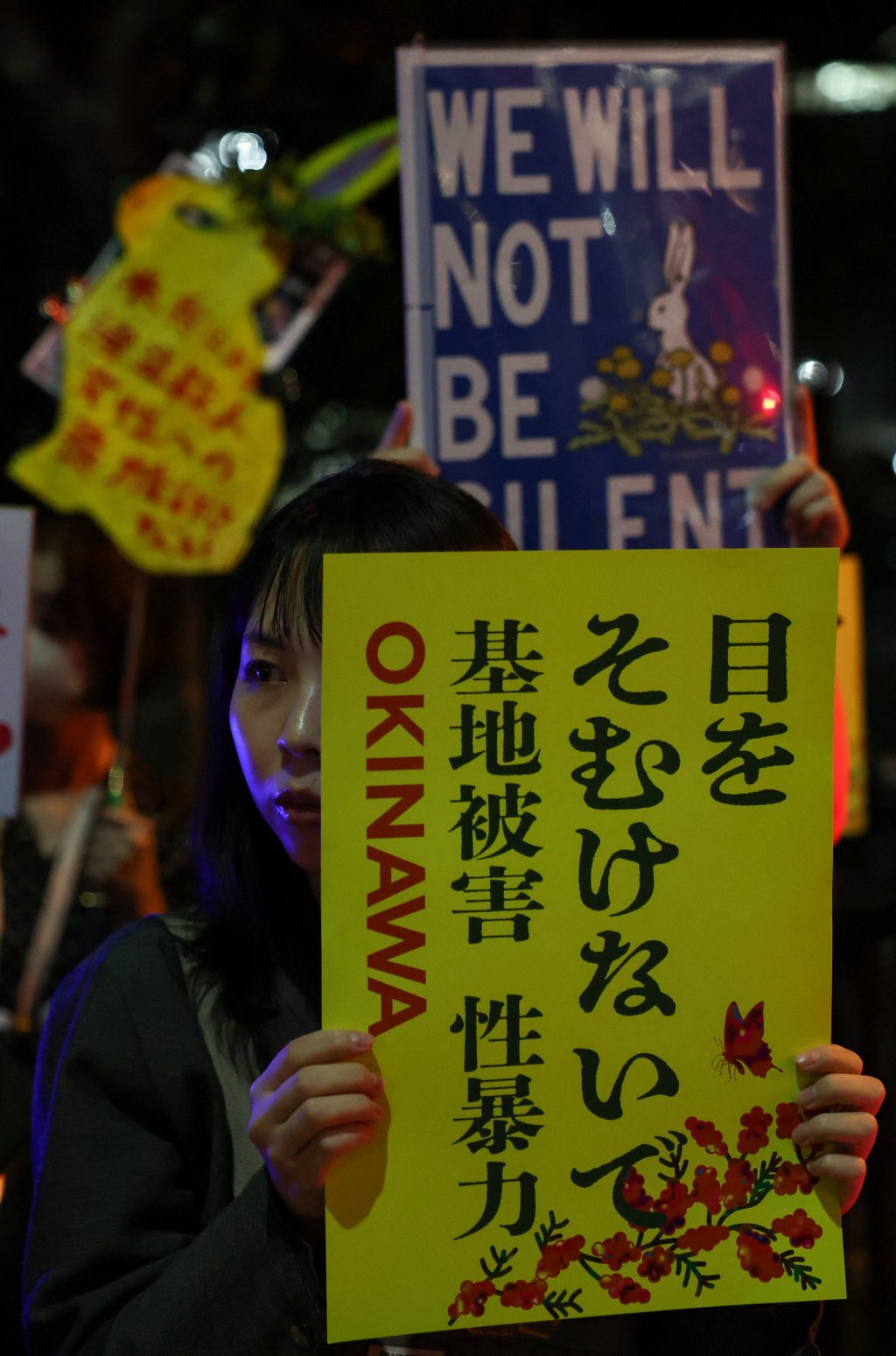 A demonstrator holds a placard during a protest outside the Prime Minister’s office following the killing of a woman in Naha, who Devin Ballard, a US Marine, is charged with robbing and murdering, in Tokyo, Japan, on October 5. Photo: Reuters A demonstrator holds a placard during a protest outside the Prime Minister’s office following the killing of a woman in Naha, who Devin Ballard, a US Marine, is charged with robbing and murdering, in Tokyo, Japan, on October 5. Photo: Reuters