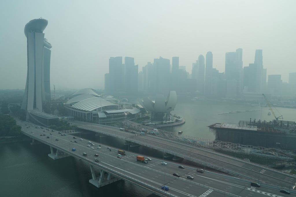A thick haze obscures the skyline of Singapore on October 9. Photo: AP A thick haze obscures the skyline of Singapore on October 9. Photo: AP