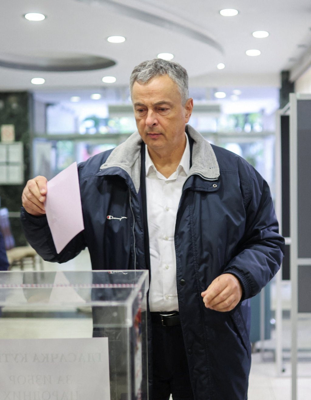 Former Governor of National Bank of Serbia (NBS) and a candidate on the electoral list ‘Student List,’ Dejan Soskic, votes in Belgrade, Serbia, on Sunday. Photo: Reuters