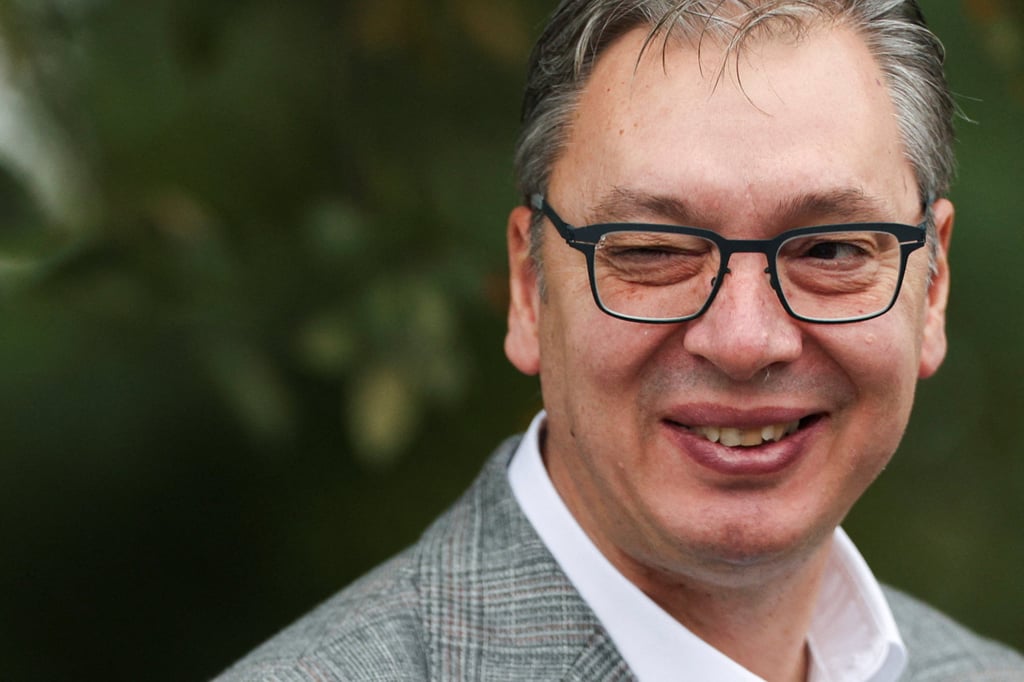 Serbia’s former president and the ruling Serbian Progressive Party (SNS) prime ministerial candidate Aleksandar Vucic winks as he arrives to vote at a polling station in Belgrade, Serbia, on Sunday. Photo: Reuters