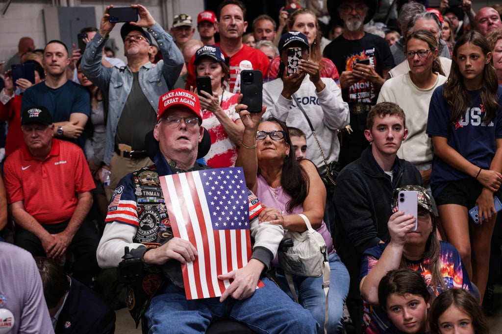 Supporters listen to Trump’s speech in Perry, Georgia. Photo: Getty Images via AFP