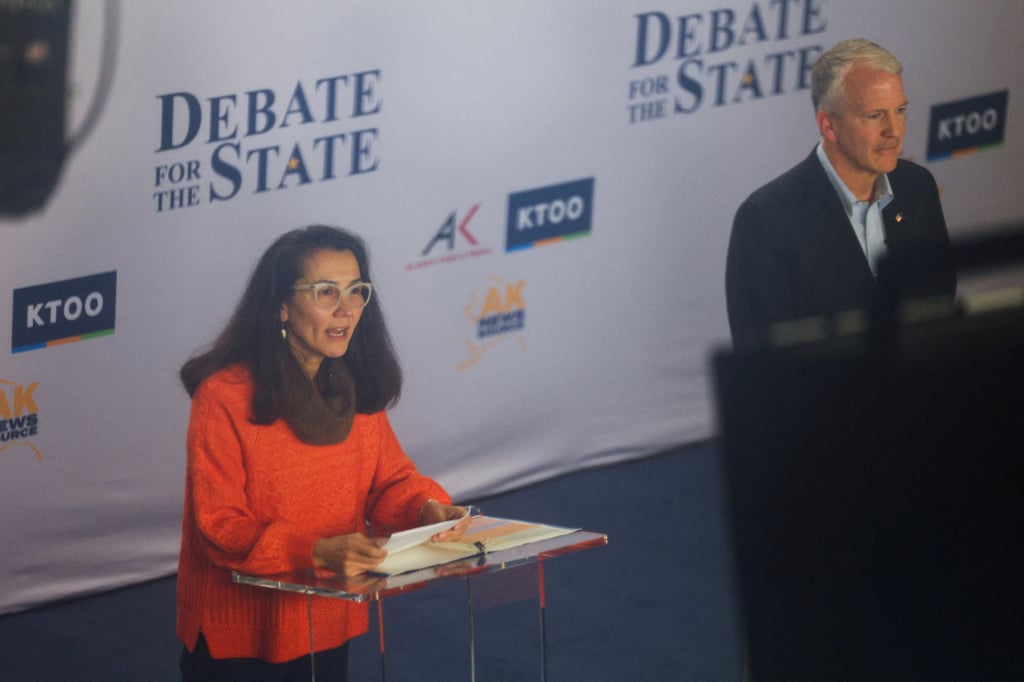 Republican US Senator Dan Sullivan (right) and Democratic US Senate candidate Mary Peltola take part in a debate in Anchorage, Alaska on October 15. Photo: Reuters