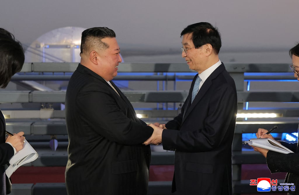 Kim bids farewell to Wang Huning, a top Chinese official, on the New Yalu River Bridge in Dandong. Photo: KCNA via KNS/AFP Kim bids farewell to Wang Huning, a top Chinese official, on the New Yalu River Bridge in Dandong. Photo: KCNA via KNS/AFP