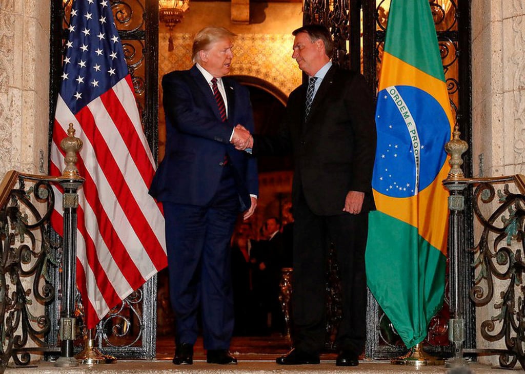 US President Donald Trump shakes hands with Jair Bolsonaro at Mar-a-Lago in Palm Beach, Florida in March 2020. Photo: Alan Santos / Presidencia da Republica via Reuters US President Donald Trump shakes hands with Jair Bolsonaro at Mar-a-Lago in Palm Beach, Florida in March 2020. Photo: Alan Santos / Presidencia da Republica via Reuters