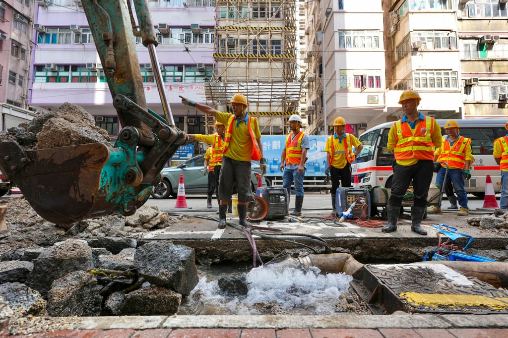 Workers conduct emergency repairs at the site of the burst pipe. Photo: Karma Lo Workers conduct emergency repairs at the site of the burst pipe. Photo: Karma Lo