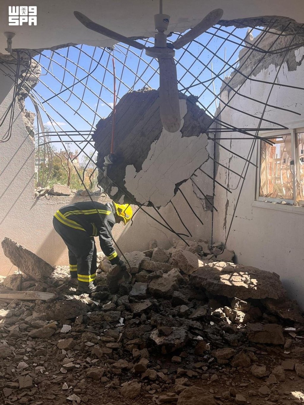 A member of the Civil Defence assessing damage in southwestern Saudi Arabia reportedly caused by debris from the interception of two ballistic missiles fired by Yemen’s Houthis on Monday. Photo: SPA / AFP A member of the Civil Defence assessing damage in southwestern Saudi Arabia reportedly caused by debris from the interception of two ballistic missiles fired by Yemen’s Houthis on Monday. Photo: SPA / AFP