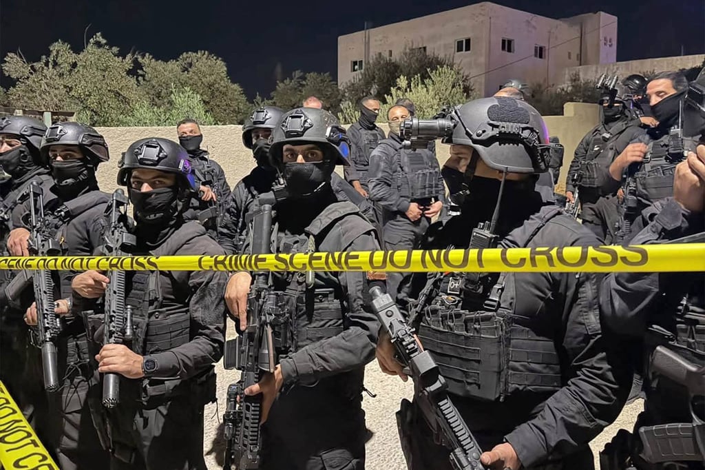 Members of Jordan’s security forces in Karak governorate ahead of a raid to detain suspects in Friday’s church shooting. Photo: Jordan’s General Security Directorate via AFP