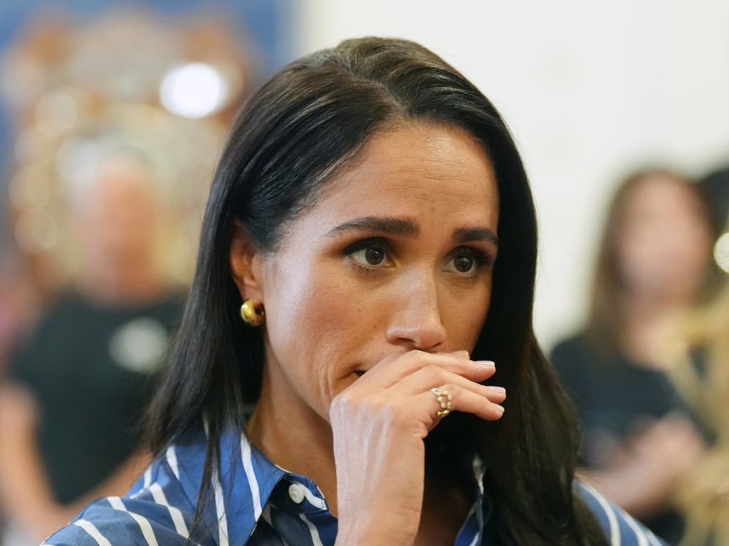Meghan Markle during a visit to Bondi Beach in Australia earlier this year. She said in a statement she was “deeply distressed” by the allegations against her father. Photo: AP Meghan Markle during a visit to Bondi Beach in Australia earlier this year. She said in a statement she was “deeply distressed” by the allegations against her father. Photo: AP