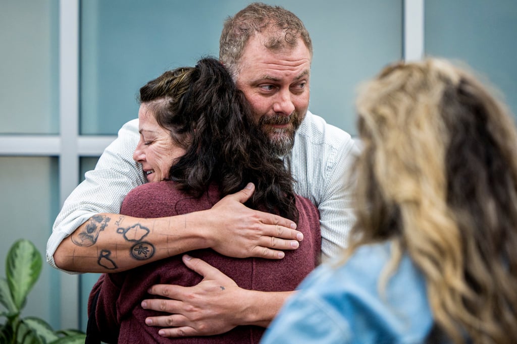 Utah County Sheriff’s Deputy Jake Hall hugs Tommi Aime, the sister of Laura Aime, after announcing that evidence has linked Ted Bundy to Laura’s murder at a news conference in Spanish Fork, Utah, in April. Photo: The Deseret News via AP