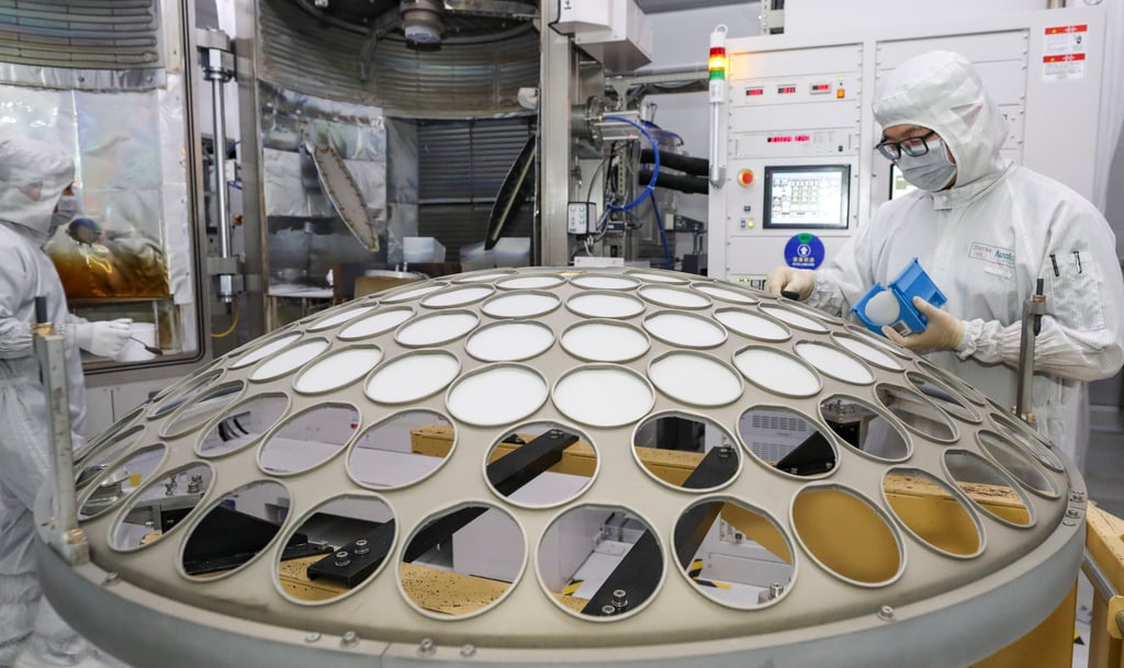 A worker processes chips in the workshop of Aoyang Shunchang Optoelectronics Technology in Huai’an, Jiangsu province, China. Photo: CFOTO/Future Publishing via Getty Images A worker processes chips in the workshop of Aoyang Shunchang Optoelectronics Technology in Huai’an, Jiangsu province, China. Photo: CFOTO/Future Publishing via Getty Images