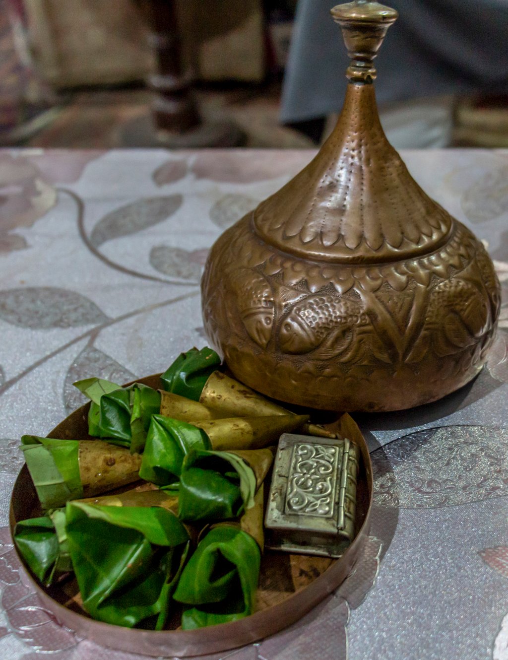 Betel leaves slathered with lime and stuffed with betel nut are served in a paandaan (betel leaf container) in Lucknow, Uttar Pradesh, India. Betel nuts, also called areca nuts, remain popular in parts of Asia and Africa. Photo: Rathina Sankari Betel leaves slathered with lime and stuffed with betel nut are served in a paandaan (betel leaf container) in Lucknow, Uttar Pradesh, India. Betel nuts, also called areca nuts, remain popular in parts of Asia and Africa. Photo: Rathina Sankari