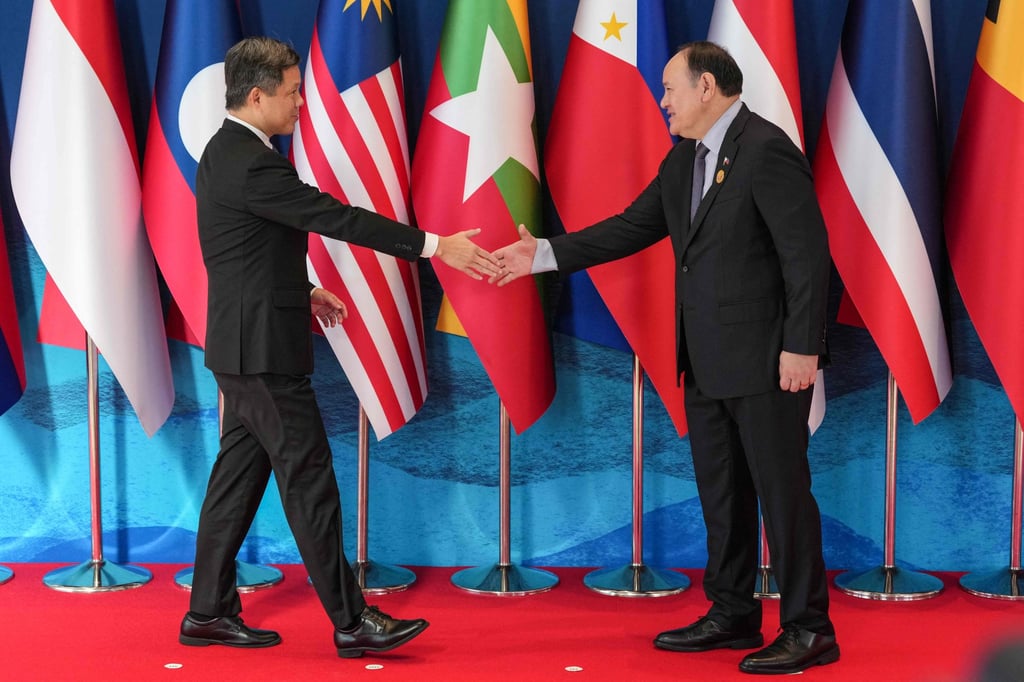 Singapore’s Defence Minister Chan Chun Sing (left) is welcomed by his Philippine counterpart Gilberto Teodoro during the Asean Defence Ministers’ Meeting in Cebu on Wednesday. Photo: AFP Singapore’s Defence Minister Chan Chun Sing (left) is welcomed by his Philippine counterpart Gilberto Teodoro during the Asean Defence Ministers’ Meeting in Cebu on Wednesday. Photo: AFP