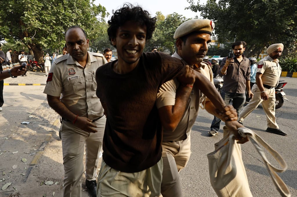 A protester is detained by police in New Delhi, India, in October during a demonstration demanding the resignation of Chief Election Commissioner Gyanesh Kumar. Photo: dpa A protester is detained by police in New Delhi, India, in October during a demonstration demanding the resignation of Chief Election Commissioner Gyanesh Kumar. Photo: dpa
