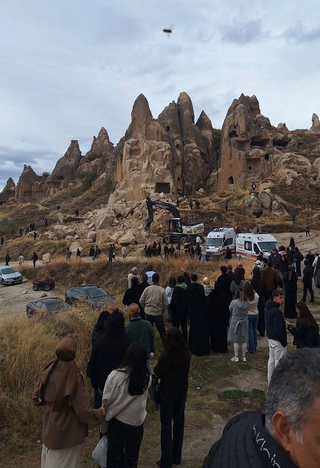 Ambulances are seen at a collapsed rock formation in Cappadocia on Thursday. Photo: Demiroren News Agency via AFP Ambulances are seen at a collapsed rock formation in Cappadocia on Thursday. Photo: Demiroren News Agency via AFP