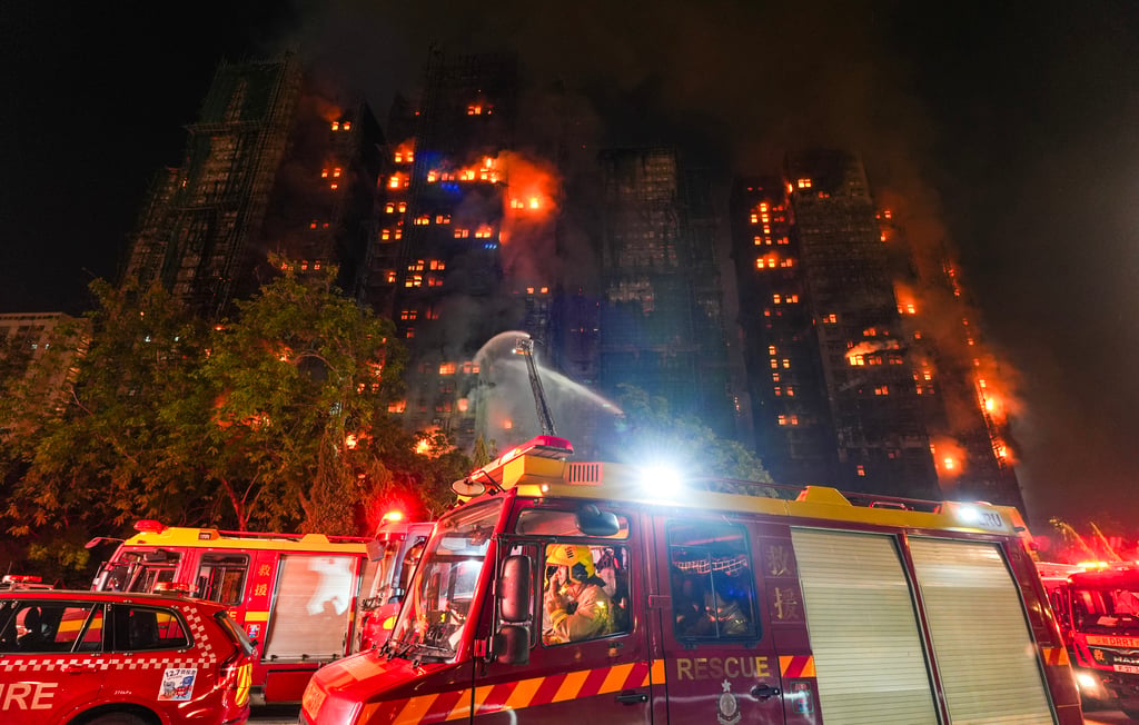 Firefighters battle the blaze at Wang Fuk Court in Tai Po on November 26. Photo: Eugene Lee Firefighters battle the blaze at Wang Fuk Court in Tai Po on November 26. Photo: Eugene Lee