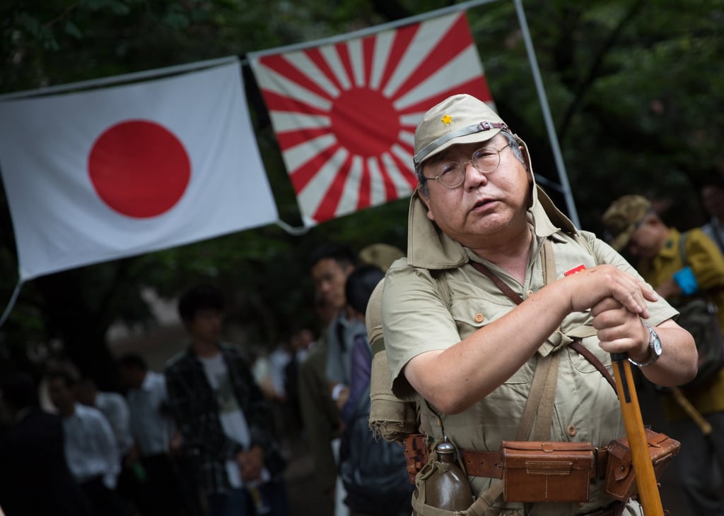A Japanese man wearing an imperial army uniform at Tokyo’s controversial Yasukuni Shrine, which honours Japan’s wartime dead, in 2017. Photo: EPA-EFE