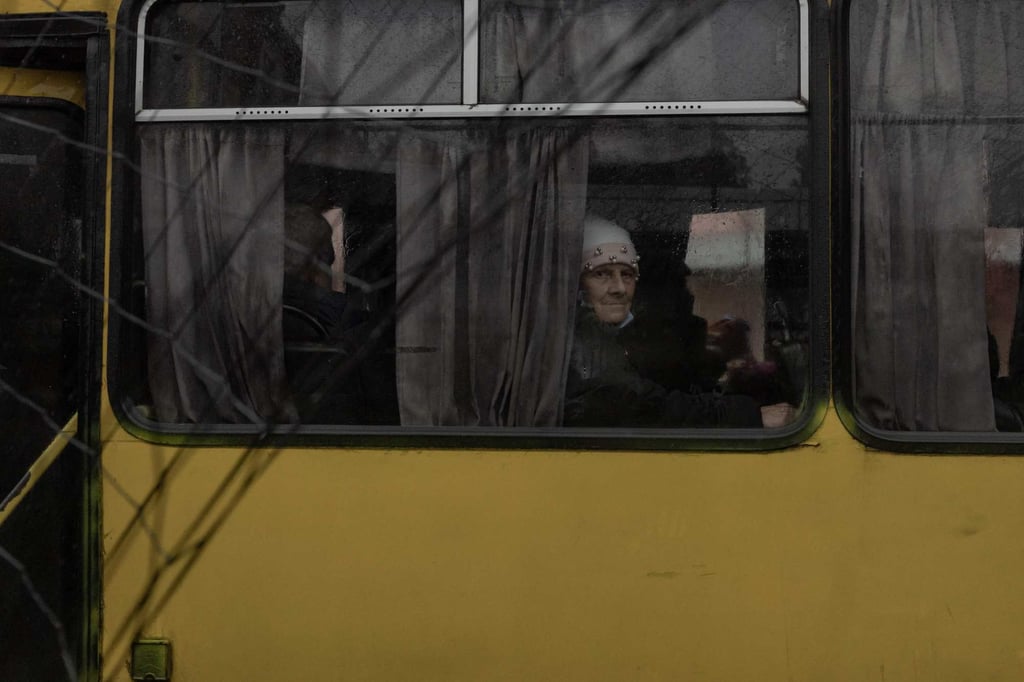 A woman looks on from a bus at a bus station with an anti-drone net in the foreground during a temporary ceasefire in the city of Kherson, near Oleshky. The ceasefire has given Kherson residents relief from daily drone attacks. Photo: AFP A woman looks on from a bus at a bus station with an anti-drone net in the foreground during a temporary ceasefire in the city of Kherson, near Oleshky. The ceasefire has given Kherson residents relief from daily drone attacks. Photo: AFP