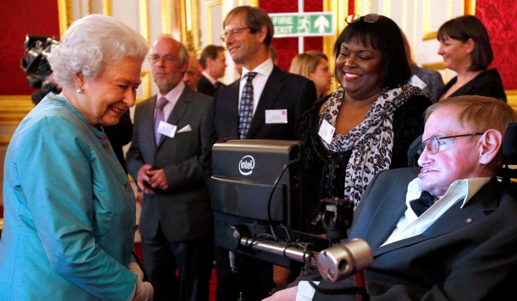 Britain’s Queen Elizabeth meets Hawking with nurse Patricia Dowdy at St James’s Palace in London in May 2014. Photo: Reuters