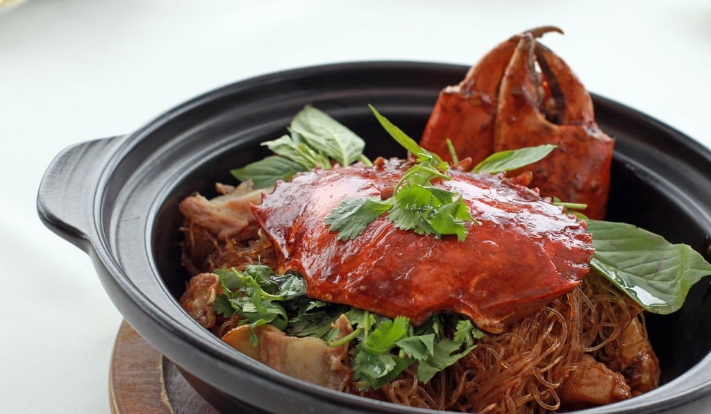 Baked crab with vermicelli and home-made sauce in casserole
