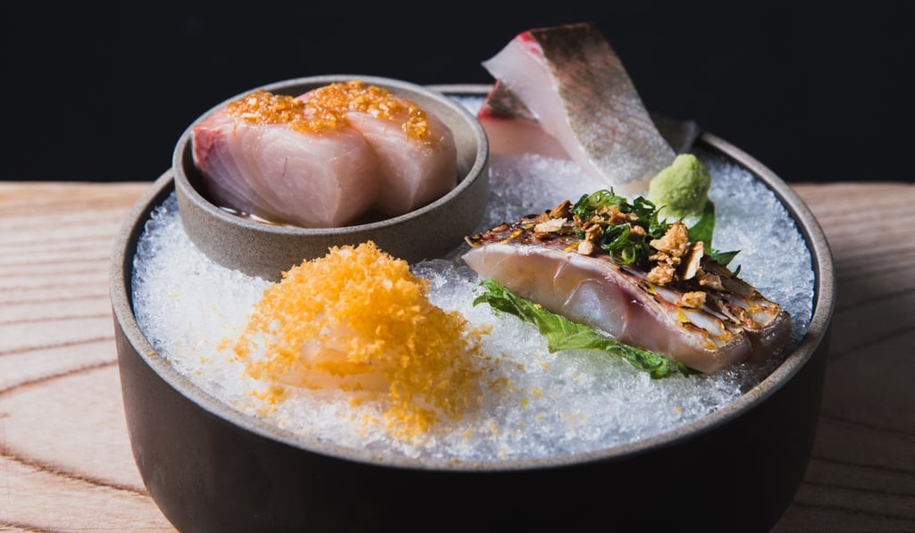 A dish of sashimi presented with flair at Ronin.