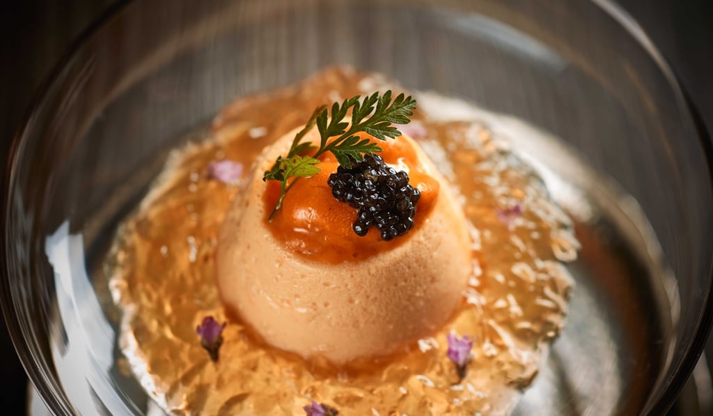 Home-made fresh sea urchin pudding with consommé jelly