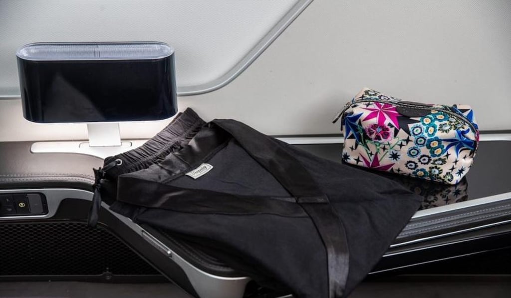 First-class passengers can relax using Temperley London loungewear and a selection of skincare products in an amenities bag from Elemis. First-class passengers can relax using Temperley London loungewear and a selection of skincare products in an amenities bag from Elemis.