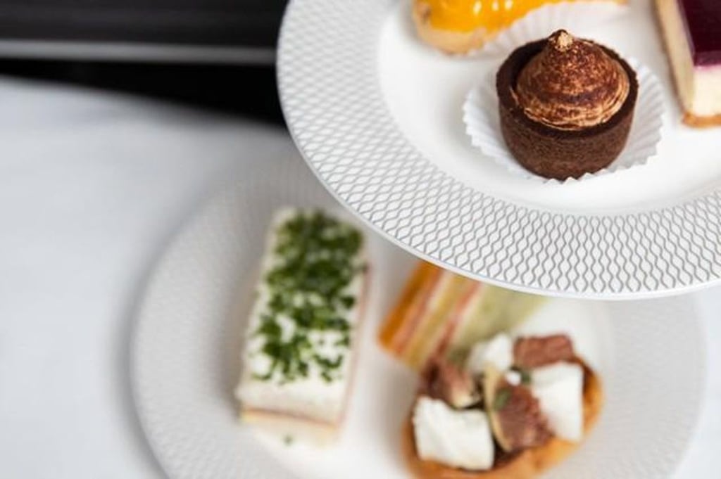 British Airways is serving a new afternoon tea service in first class, which includes a selection of sandwiches, scones, pastries and teas. British Airways is serving a new afternoon tea service in first class, which includes a selection of sandwiches, scones, pastries and teas.