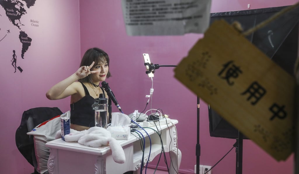 KOLs hired by Hifan Multi-Channel Network in Guangzhou, China, broadcast online in the Company’s compartment offices. Photo: SCMP
