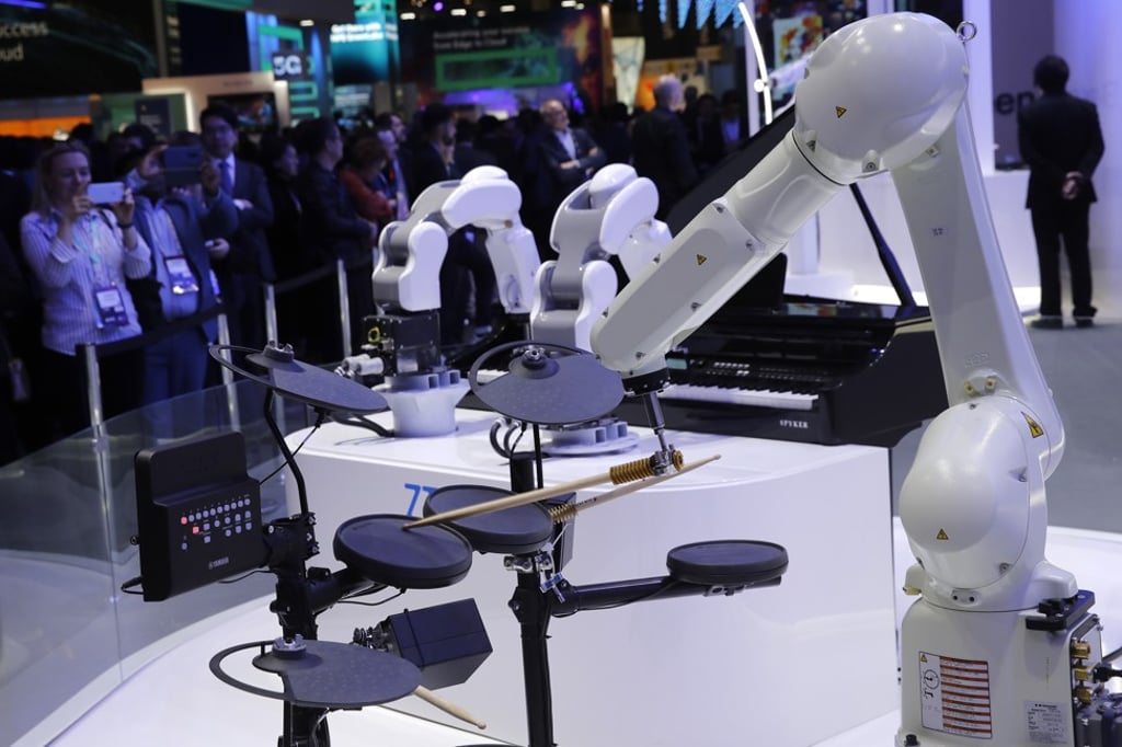 A 5G controlled robotic arm plays a drum kit as part of a smart connected band at the ZTE stand at a wireless industry conference in Barcelona. Photo: Bloomberg A 5G controlled robotic arm plays a drum kit as part of a smart connected band at the ZTE stand at a wireless industry conference in Barcelona. Photo: Bloomberg