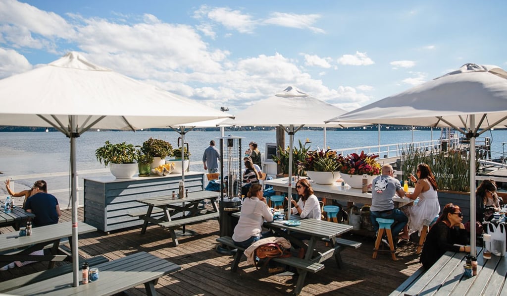 Sit on the pier overlooking Pittwater and watch the boats and pelicans glide by. Photo: The Boat House