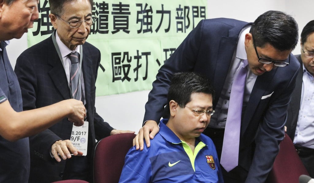 Howard Lam flanked by Democratic Party members at his 2017 press conference. Photo: Felix Wong