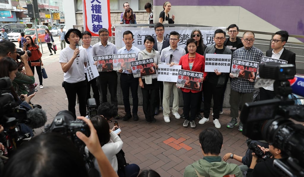 Pan-democrats outside Mong Kok Police Station. The camp has announced new measures, including protests, to fight the proposed fugitive law. Photo: Winson Wong
