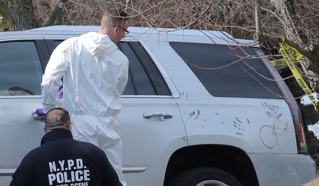 Investigators work at the scene where New York mafia Gambino family crime boss, Francesco “Franky Boy” Cali, was killed. Photo: Reuters