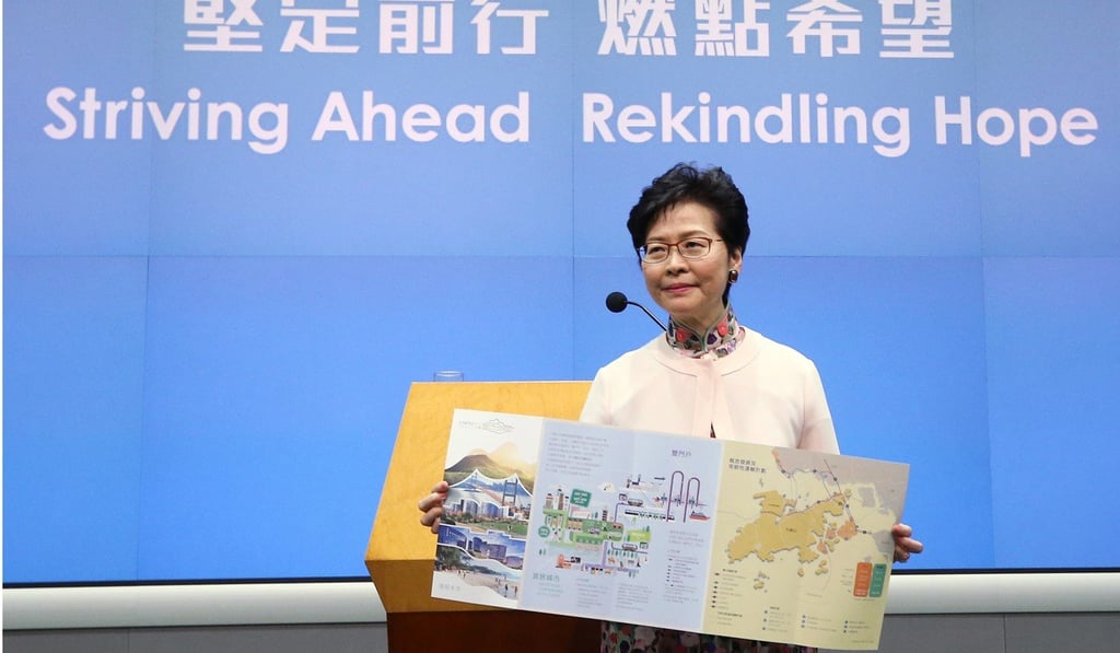 Chief Executive Carrie Lam Cheng Yuet-ngor shows a pamphlet on the Lantau Tomorrow Vision proposal during a press conference on October 10, 2018. Photo: Dickson Lee