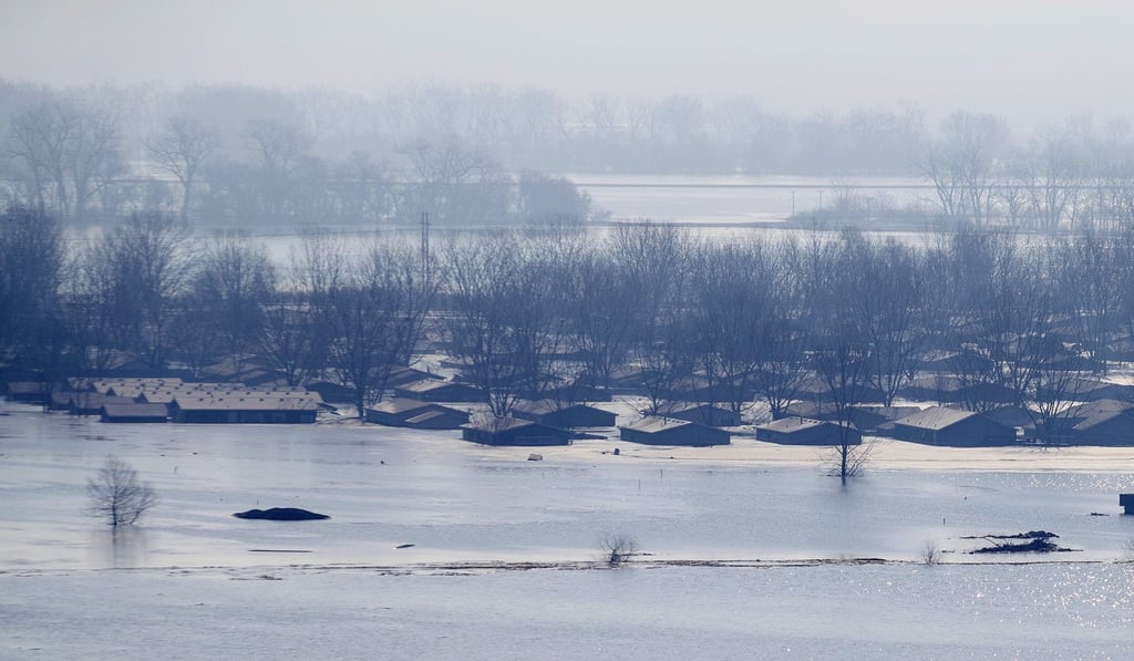 A neighbourhood is nearly covered in floodwaters from the Missouri River. Photo: Omaha World-Herald via AP
