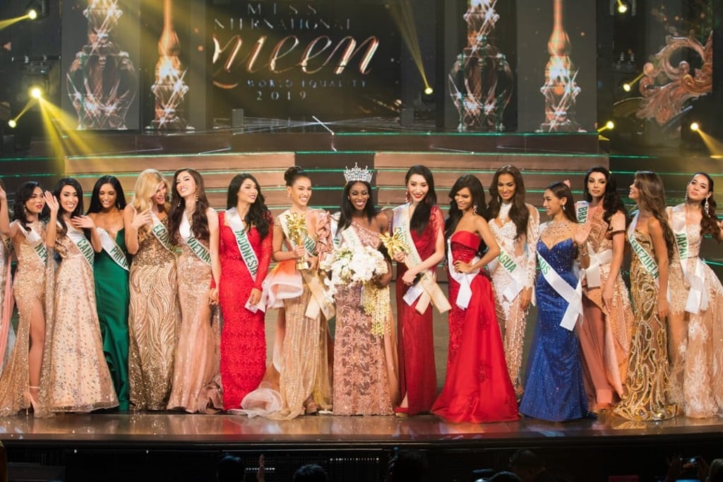 Contestants in evening gowns Contestants in evening gowns