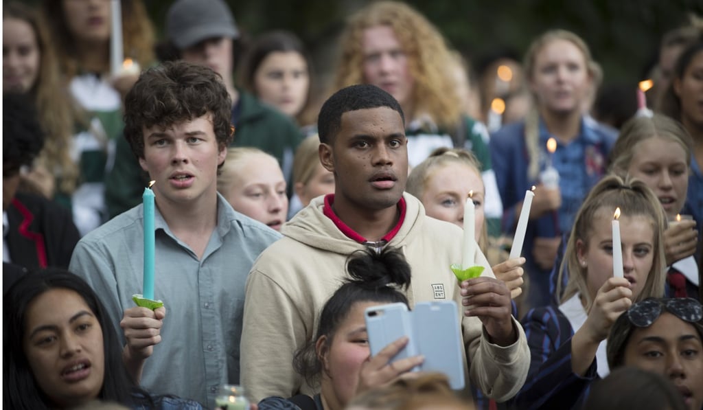 Students in Christchurch gather for a vigil to commemorate victims of the attack. Photo: AP