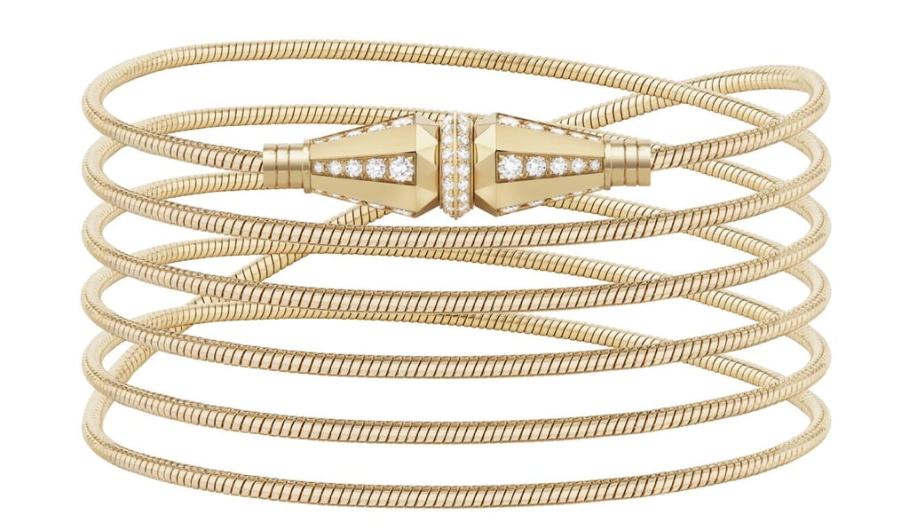 A yellow-gold Jack de Boucheron transformable ‘long necklace’, with a motif set with diamonds, which can be worn as a necklace or bracelet. A yellow-gold Jack de Boucheron transformable ‘long necklace’, with a motif set with diamonds, which can be worn as a necklace or bracelet.